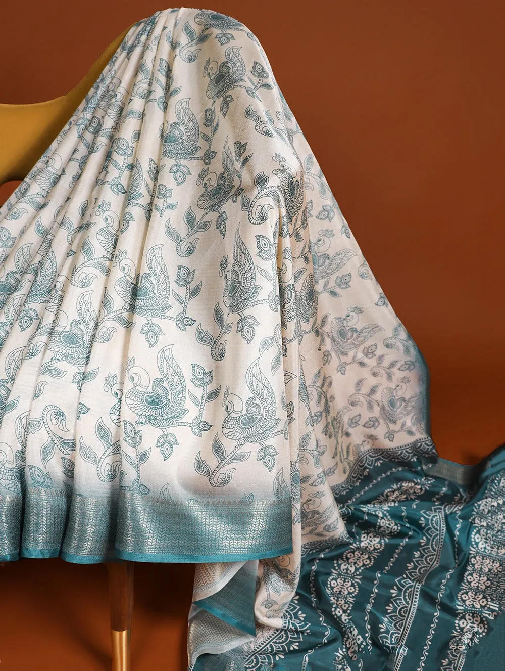 Firozi Blue Dola Silk Saree with Printed Work and Zari Border